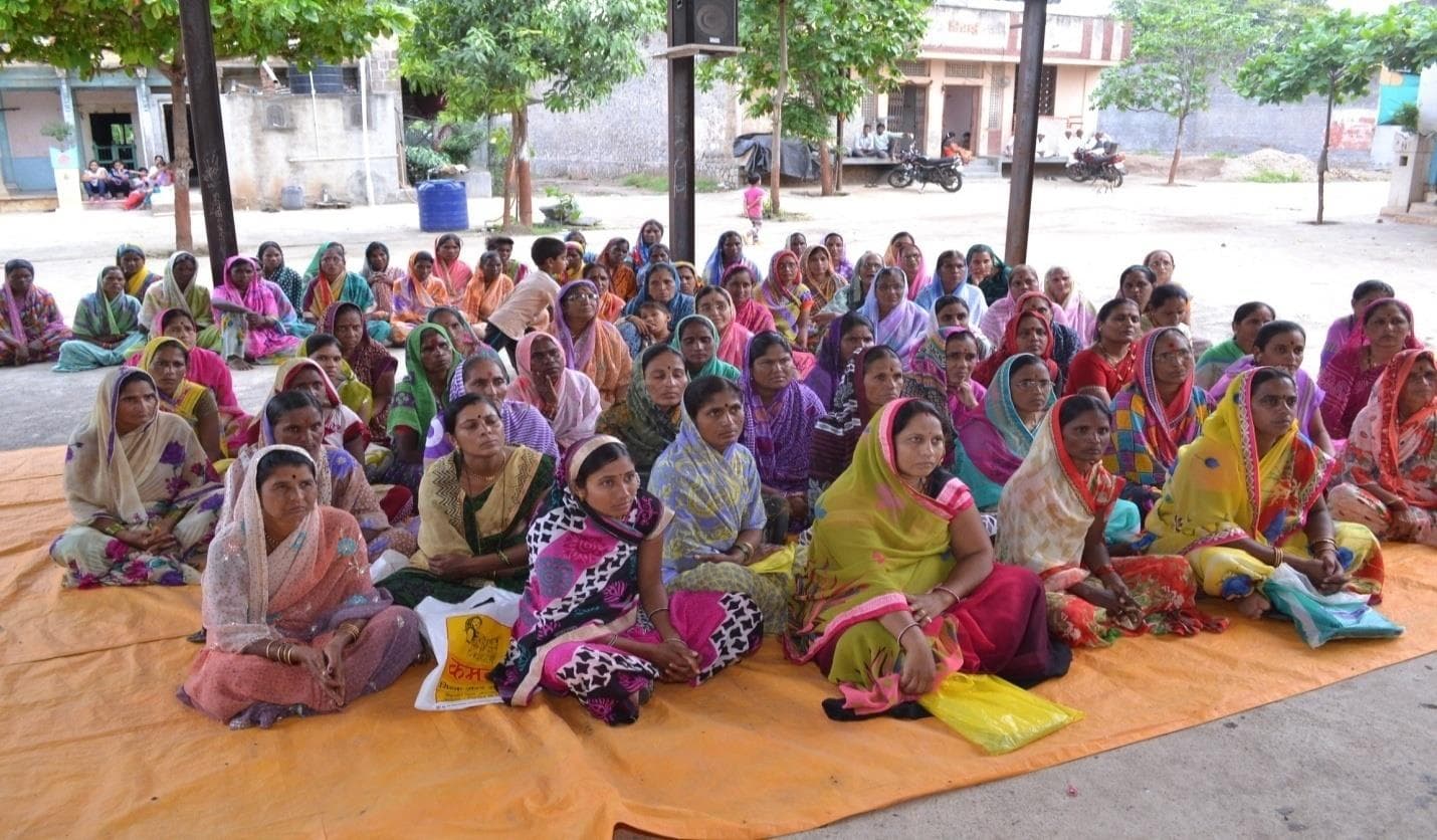 Women gathered during Self Help Group formation and grant distribution