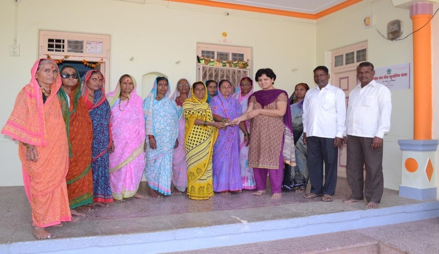 Self Help Group members with organizers after grant distribution
