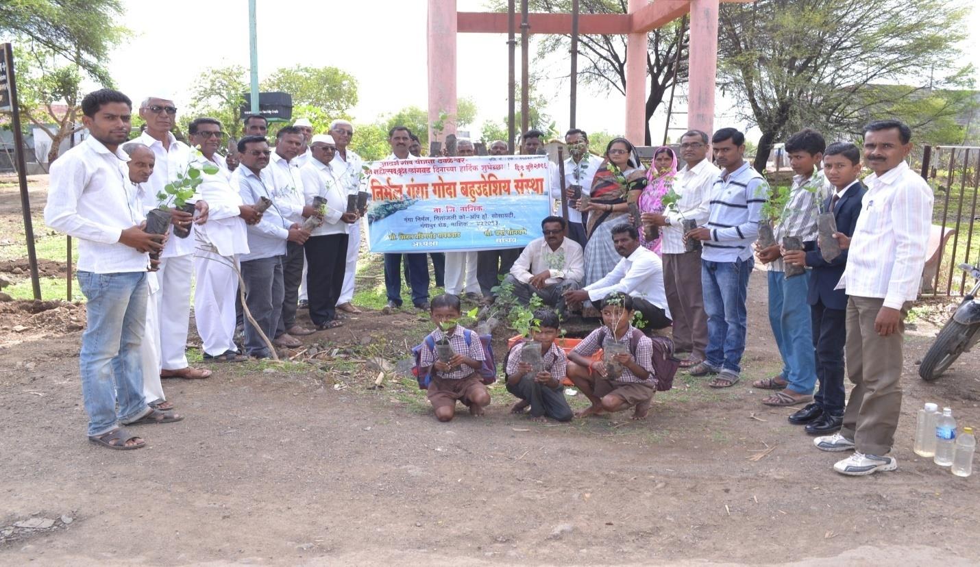 Students participating in tree plantation in DivyachaPada Village